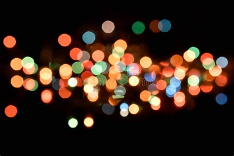 Abstract Blurry Small Light Glowing In The Dark Night Background Stock