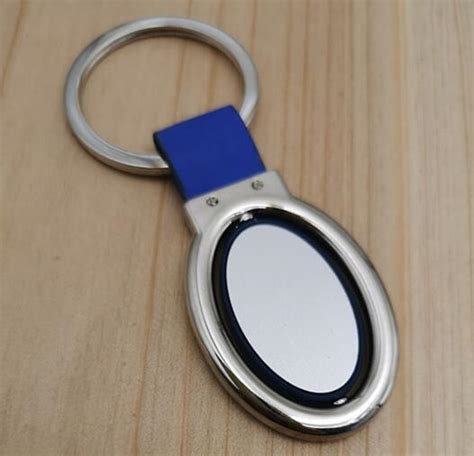 2 Color Oval Rotate Keyring Giftarget Inc