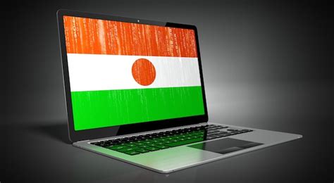 Premium Photo Niger Country Flag And Binary Code On Laptop Screen D