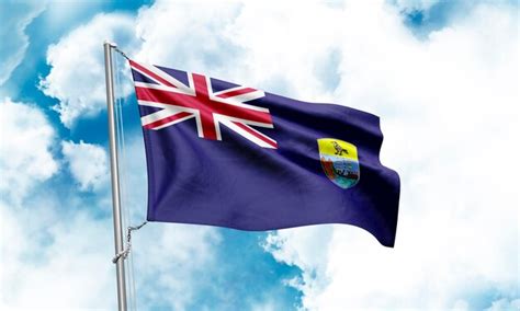 Premium Photo Saint Helena Flag Waving On Sky Background 3d Rendering