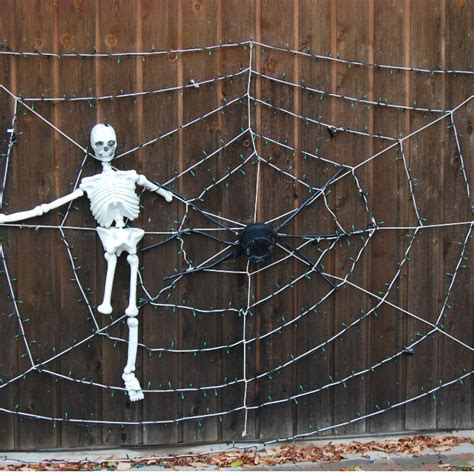 DIY Giant Halloween Spider Web - By The Woodland Elf