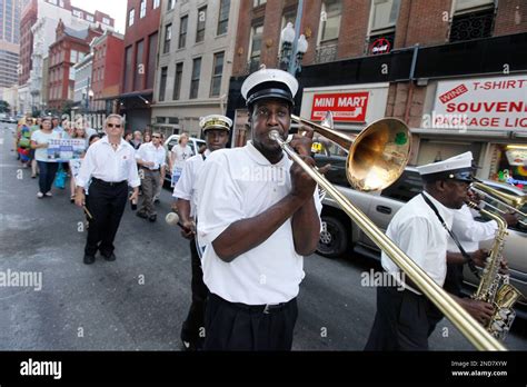 A Brass Band Plays As Singer Charmaine Neville Actress Shauna Rappold