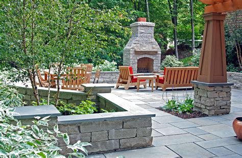 This Raised Terrace Was Redone With A Stone Fireplace Bluestone Patio