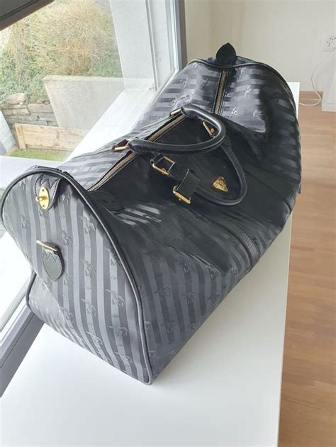 Original Maison Mollerus Reisetasche FLUELA Schwarz Gold Kaufen Auf