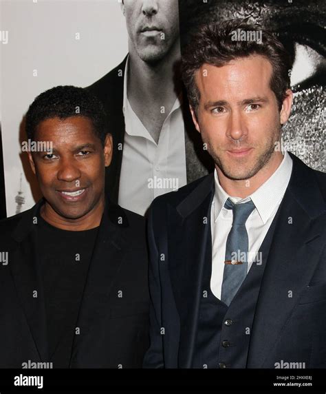 Denzel Washington And Ryan Reynolds During The Safe House New York