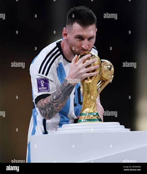 Argentina S Lionel Messi Kisses The Fifa World Cup Trophy After Being