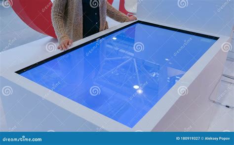 Woman Using Interactive Touchscreen Display Table Stock Image Image