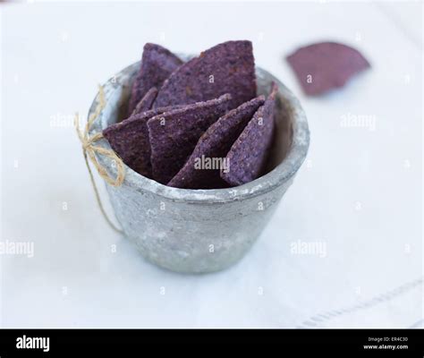 Purple Corn Tortilla chips Stock Photo - Alamy