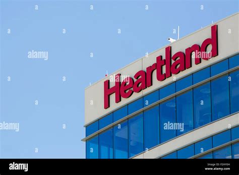 A Logo Sign Outside Of A Facility Occupied By Heartland Payment Systems