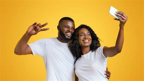 Beautiful Afro Couple Taking Selfie On Smartphone Stock Image Image