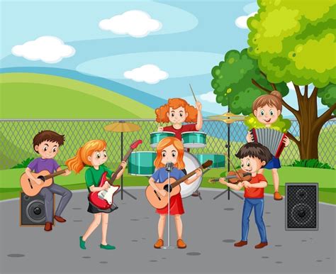 Niños tocando instrumentos musicales en el parque Vector Premium