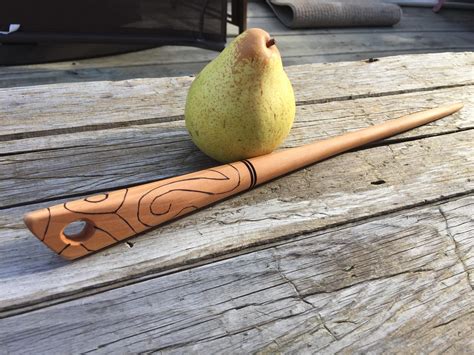 My first time working with Pear wood! Love that golden colour! This wand is 14” long and ...