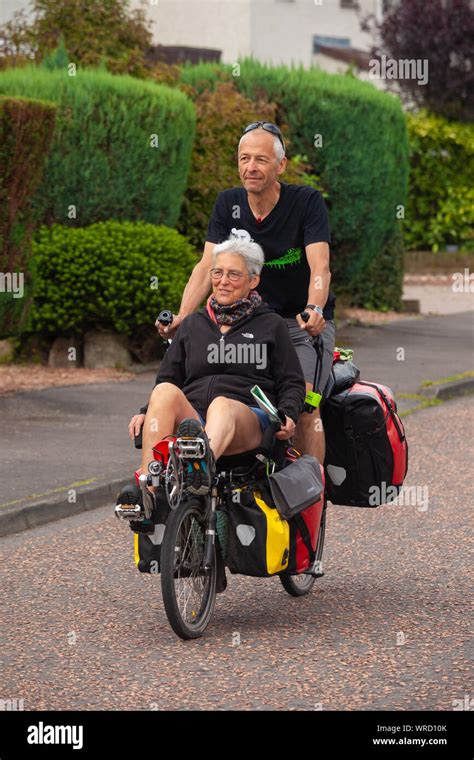 A Mature Couple Riding A Pino Tandem Stock Photo Alamy