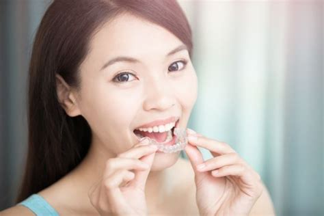 Wearing Retainers Nightly To Maintain Results After Invisalign Treatment Oak Tree Dental