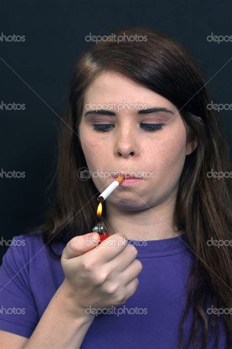 Beautiful Brunette Lights A Cigarette Stock Photo Csproductions