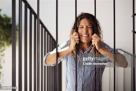 467 Prison Bars Woman Stock Photos, High-Res Pictures, and Images - Getty Images