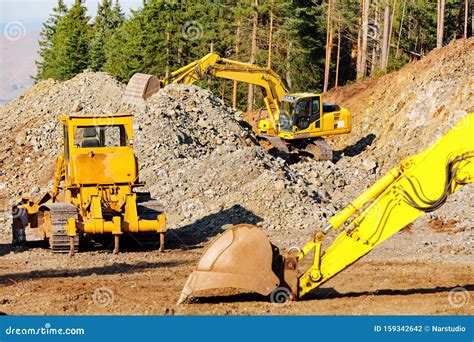 Heavy Earth Movers At Construction Site Stock Photo Image Of Group