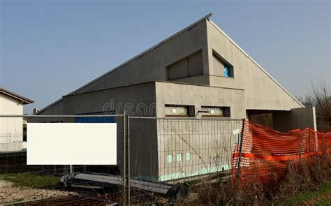 Blank Information Board On A Facade Under Refurbishment At The Roadside