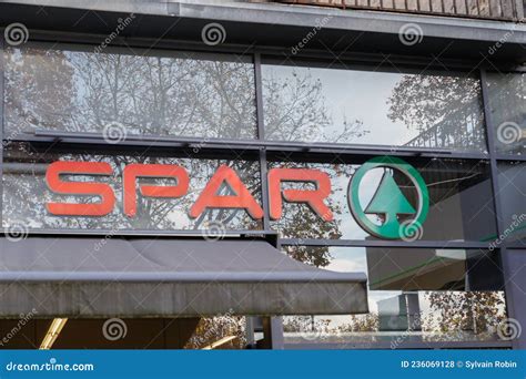 Spar Red Green Pine Tree Logo Sign And Brand Text Of Supermarket