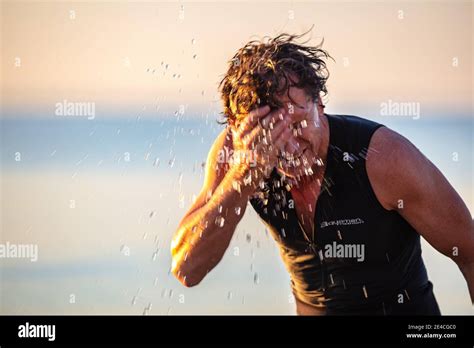 Taking Off Wetsuit Hi Res Stock Photography And Images Alamy