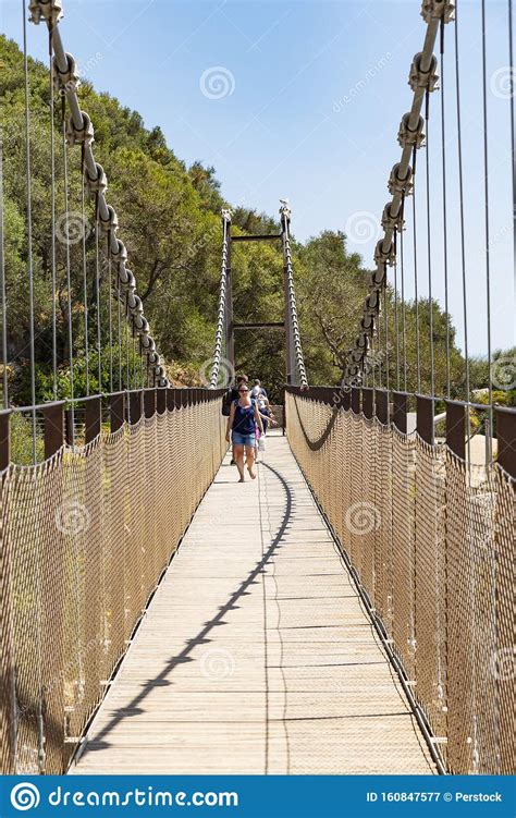 Tourists Walking On Windsor Suspension Bridge Gibraltar Editorial