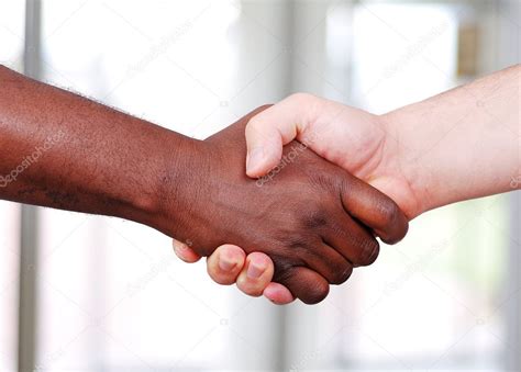 Shaking hands, black and white in the office — Stock Photo © zurijeta ...