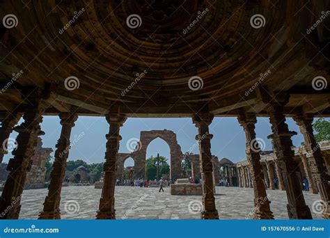 Qutub Minar Complex From Quwwat Ul Islam Mosque Pillars Taken From