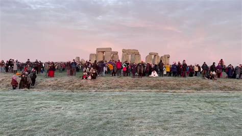 Crowds at Stonehenge Watch Sunrise on Winter Solstice