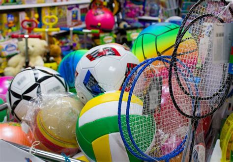 Sports Equipment for Children in the Store - Balls, Rackets, Scooters ...