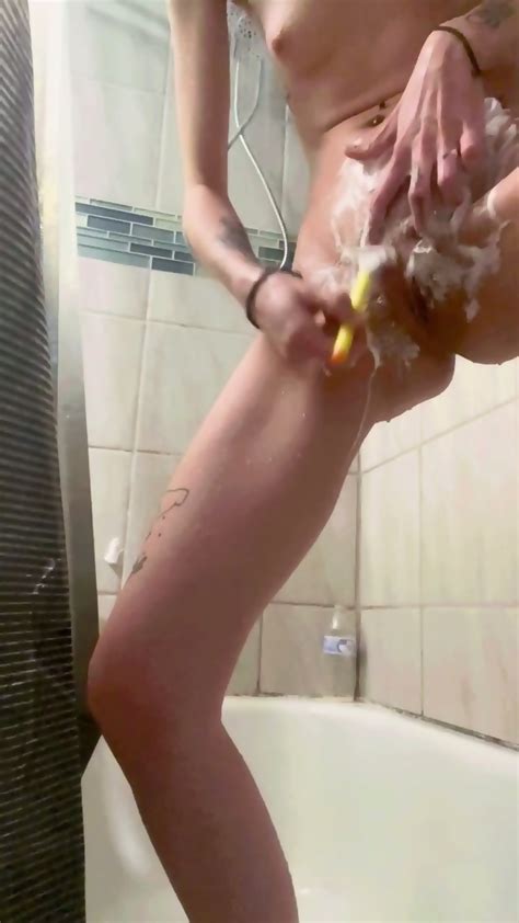 Skinny GF Showering Shaving Her Tight Pussy