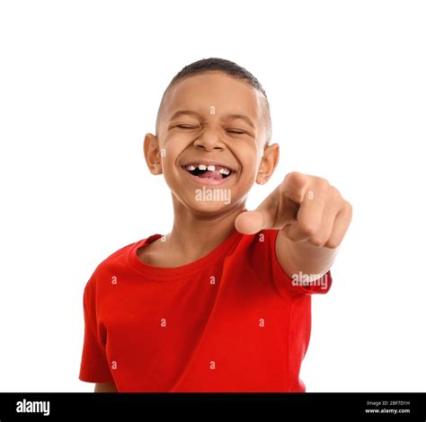 Happy laughing African-American boy on white background Stock Photo - Alamy