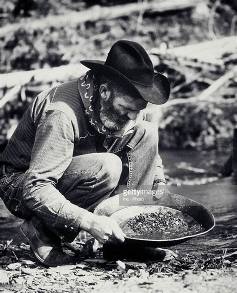 Stock Photo Prospector Pans For Gold GoldBullionBars Panning For