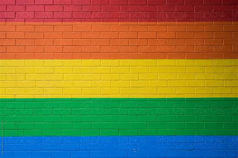 "Rainbow Brick Wall" by Stocksy Contributor "Rowena Naylor" - Stocksy