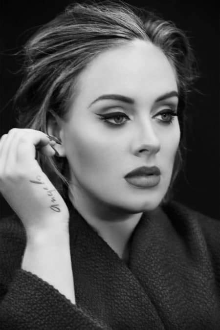 The Meaning Behind Adele’s Ten Tattoos