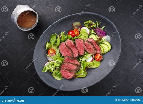 Traditional Fried Dry Aged Bison Beef Rump Steak Slices With Vegetable