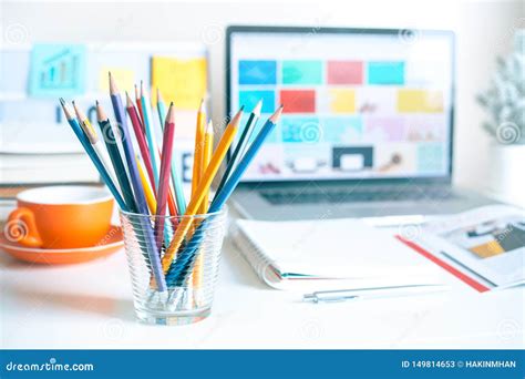 Colorful Pencil In Glass On Desk Table In Home Office Business