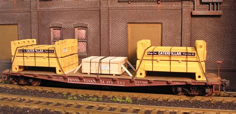 Two interesting flatcar and gondola loads - Trains