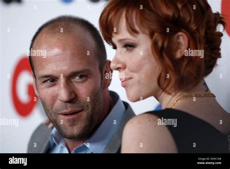 Jason Statham Left And Natalya Rudakova Arrive At The Gq Magazine