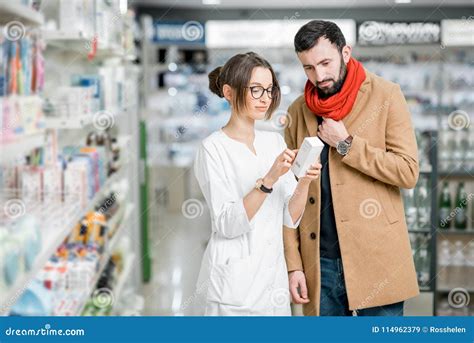 Pharmacist With Client In The Pharmacy Store Stock Image Image Of