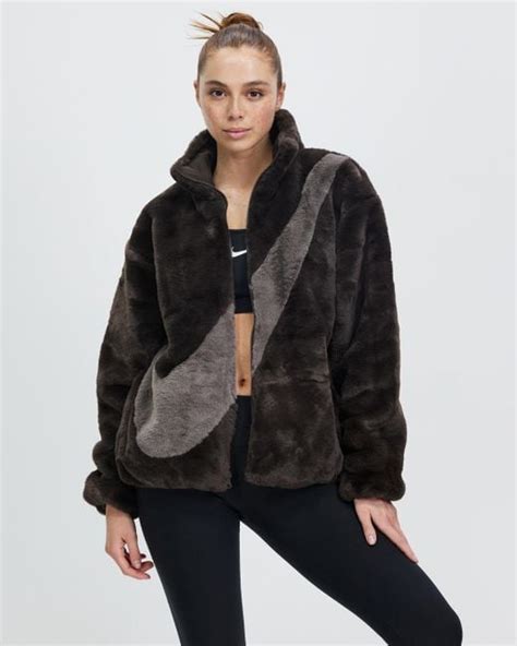 Nike Sportswear Faux Fur Swoosh Jacket In Brown Lyst Australia