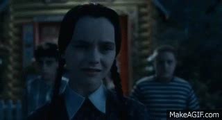 Wednesday Addams' creepy smile on Make a GIF