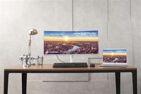 Samsung Electronics представила первый в мире изогнутый QLED монитор с ...