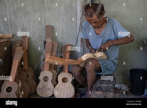 A Handmade Guitar Being Made At A Guitar Factory In Lapu Lapu Mactan