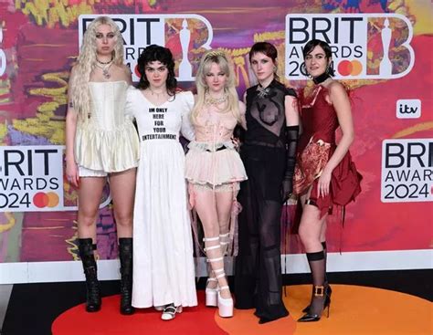 BRIT Awards Star Debuts Naked Look On Red Carpet As Viewers Spot Band Member With Boob Out