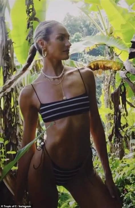 Candice Swanepoel Shows Off Her Toned Figure In A Tiny Two Piece For