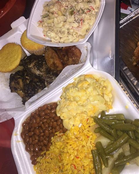 Three Plastic Trays Filled With Different Types Of Food