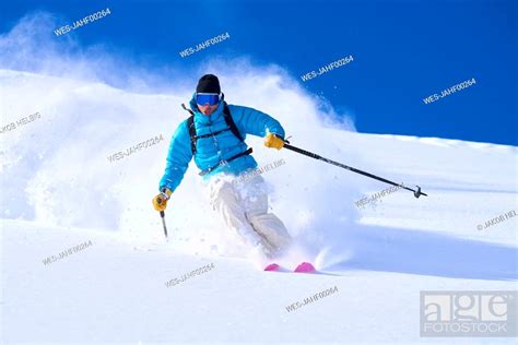 Mature man skiing in powdered snow, Stock Photo, Picture And Royalty ...