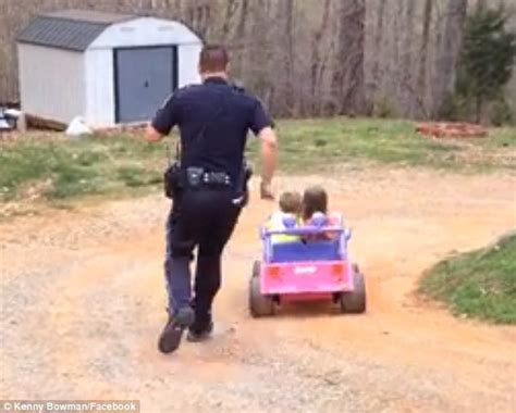 Adorable Moment Police Officer Dad Pulls Over His Kids In Toy Car For