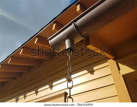 Chain Link Leading Downward Gutter Downspout Stock Photo Edit Now