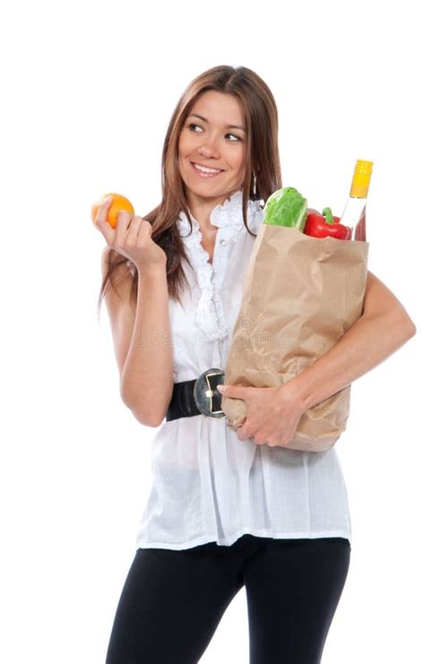 Mujer Joven Feliz Que Sostiene Un Bolso De Compras Imagen De Archivo